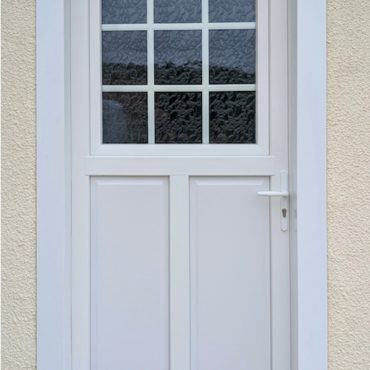 Porte PVC Campagnarde PAU Oscillo battant et petit Bois