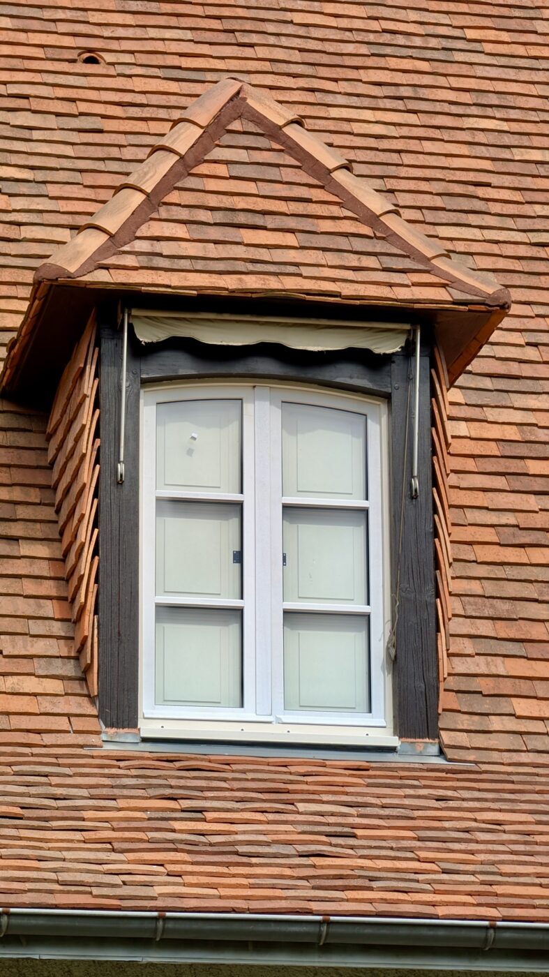 Fenêtres avec volets battants intérieurs